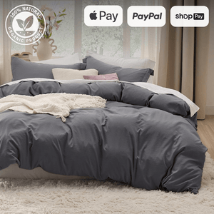 Cozy bedroom with gray bedding, organic natural product, and payment options including Apple Pay, PayPal, and Shop Pay.