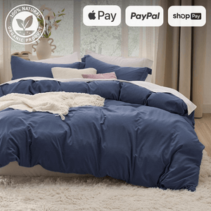 Luxurious organic bedding set in blue with multiple payment options including Apple Pay, PayPal, and Shop Pay. Cozy and eco-friendly bedroom decor.