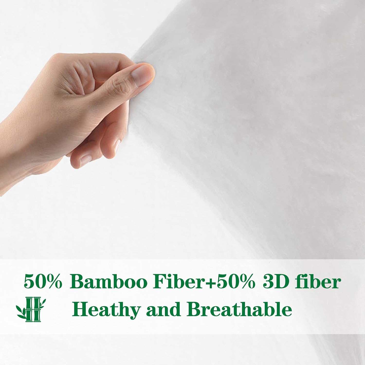 Close-up of hand holding a breathable, healthy 50% bamboo fiber and 50% 3D fiber fabric