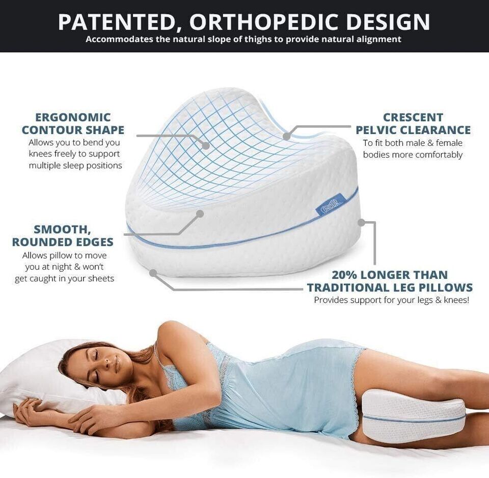 Woman sleeping with orthopedic leg pillow showcasing ergonomic contour shape, crescent pelvic clearance, and smooth, rounded edges for comfort.